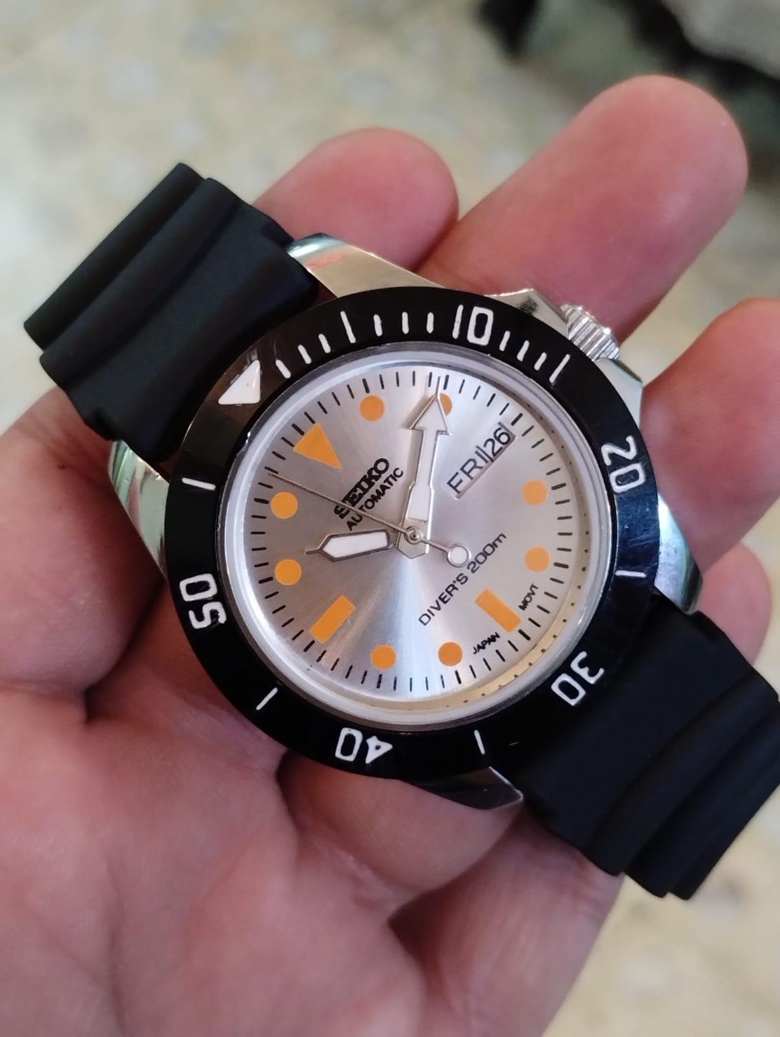Vintage Seiko 5 Automatic — Silver Dial, Orange Accents & Black Rotating Bezel