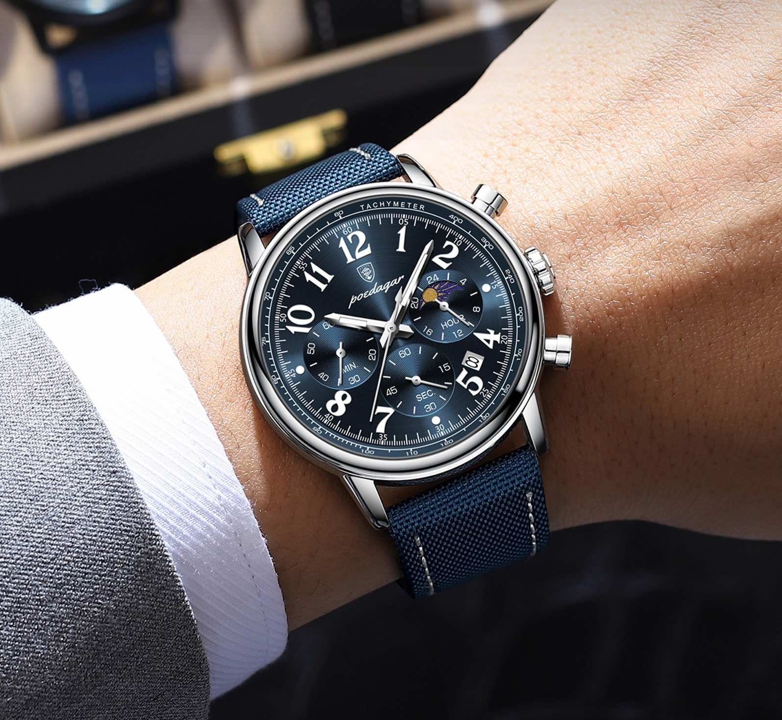 POEDAGAR 808 silver case blue dial chronograph worn on wrist