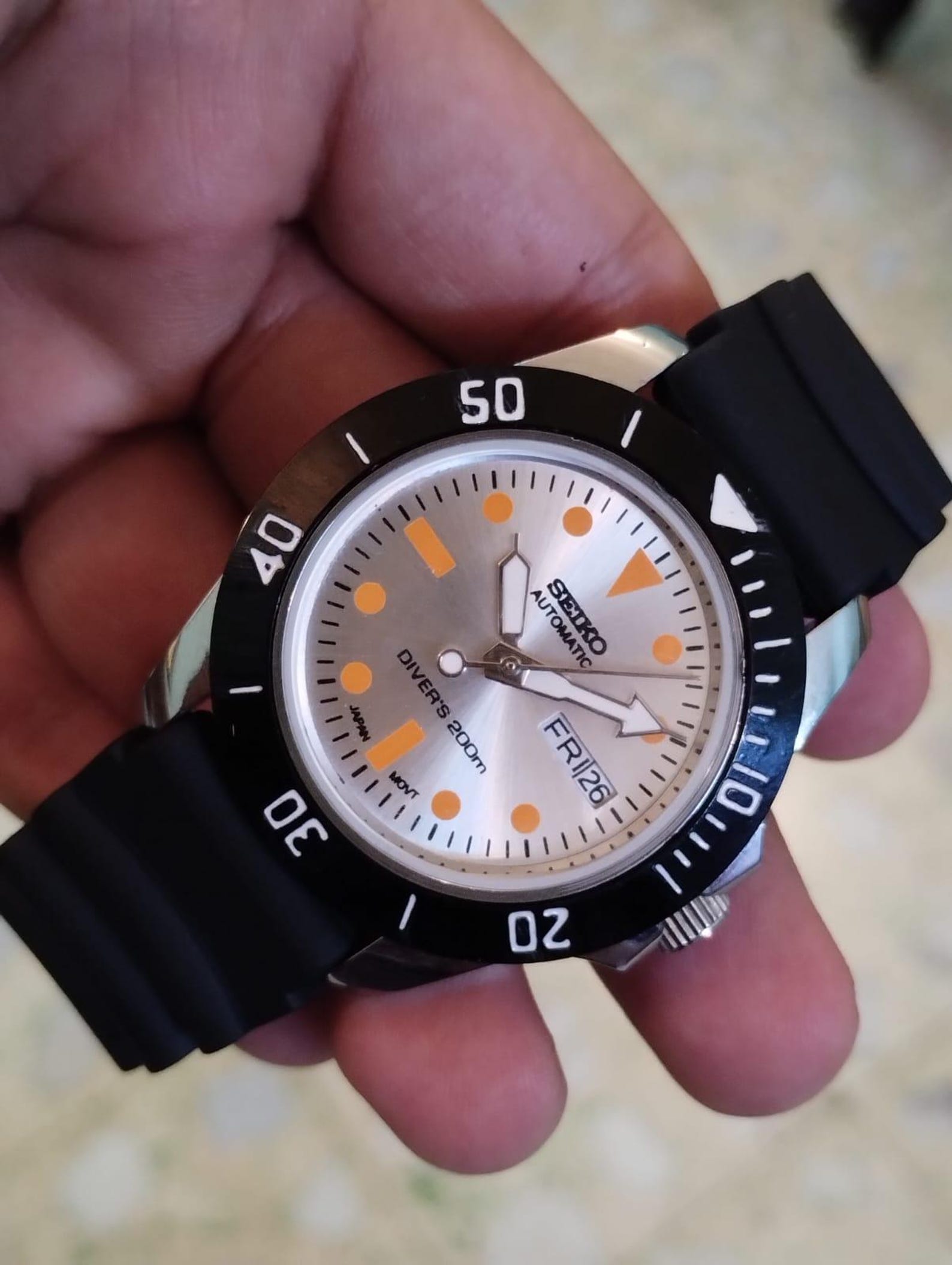 Vintage Seiko 5 Automatic — Silver Dial, Orange Accents & Black Rotating Bezel