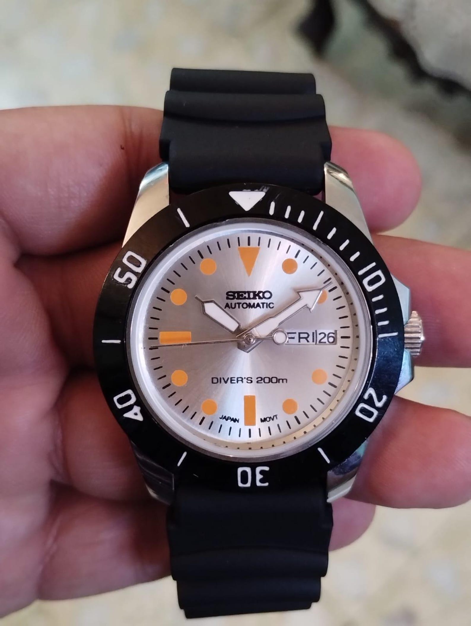 Vintage Seiko 5 Automatic — Silver Dial, Orange Accents & Black Rotating Bezel