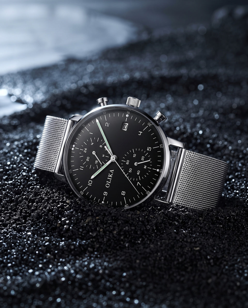 OLIKA chronograph on black sand
