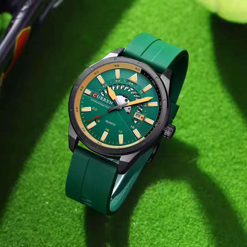 CURREN 8421 green-dial quartz watch resting on a tennis court surface