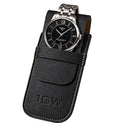 Black 1GW watch travel pouch with silver watch partially inserted