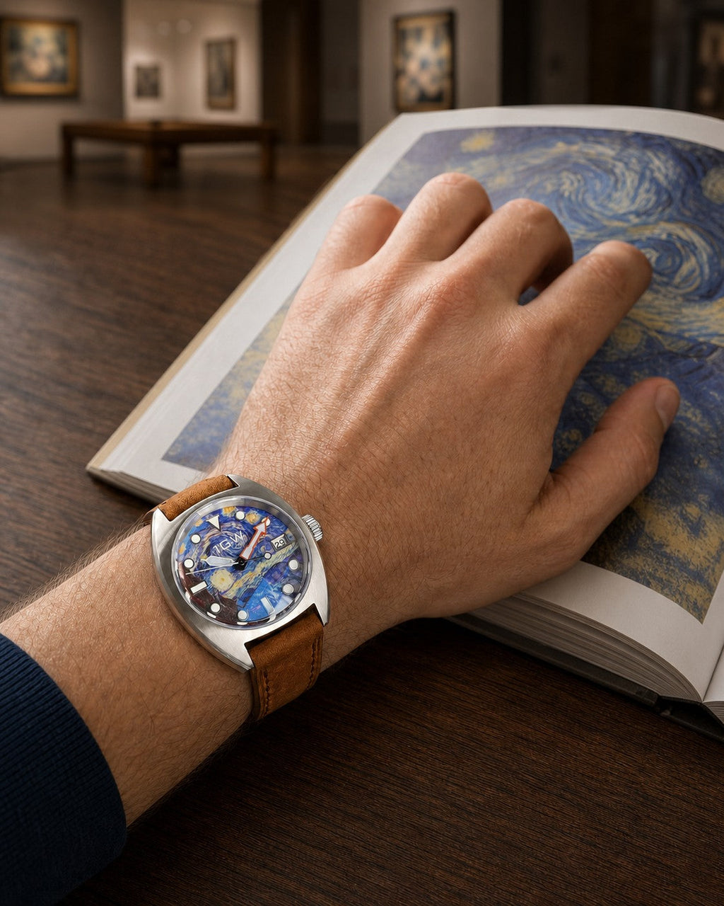 1GW Starry Night 36mm automatic watch worn while viewing a Starry Night art book in a gallery