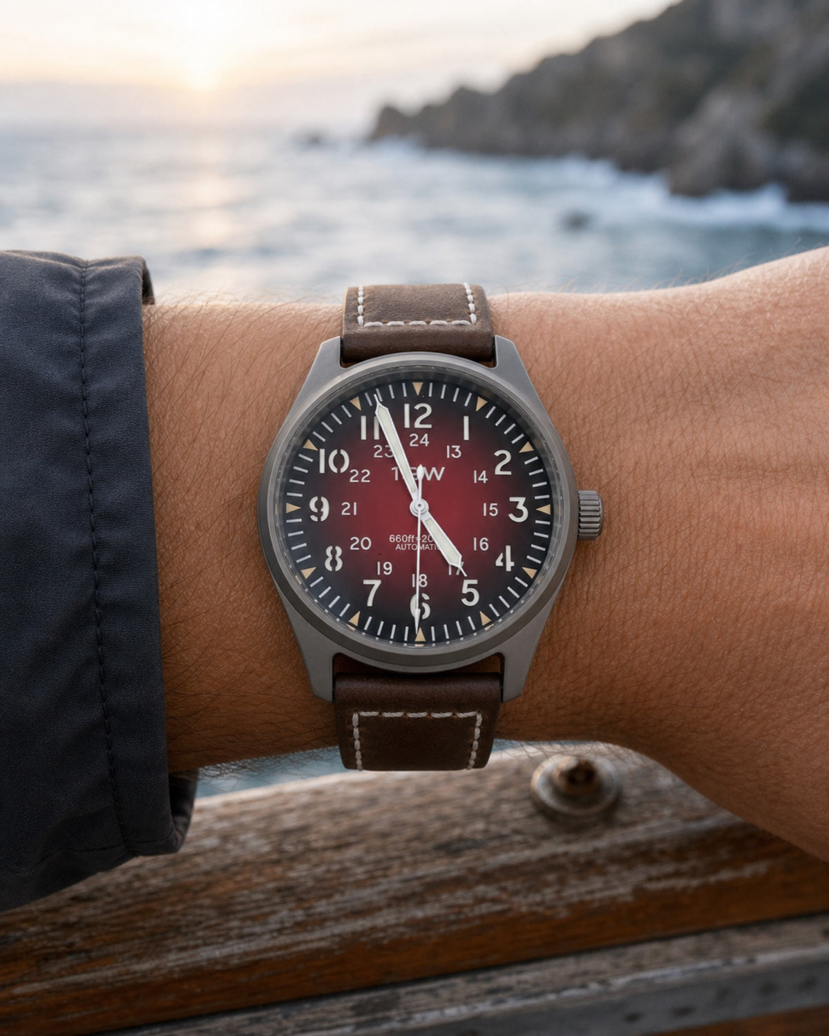 1GW Titanium Red GMT 36mm worn on the wrist at the coast