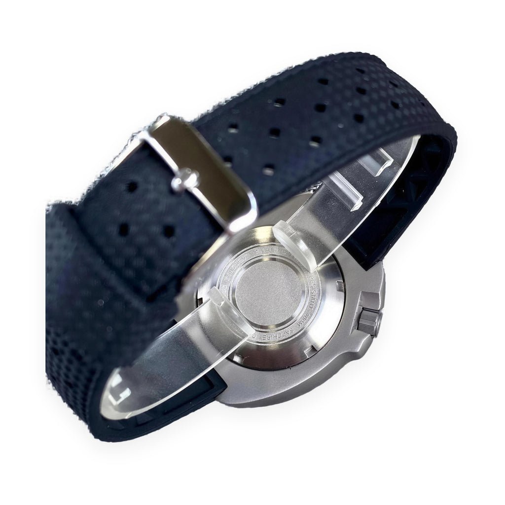 1GW Titanium Meteorite Turtle Automatic 44mm caseback on white, black rubber strap