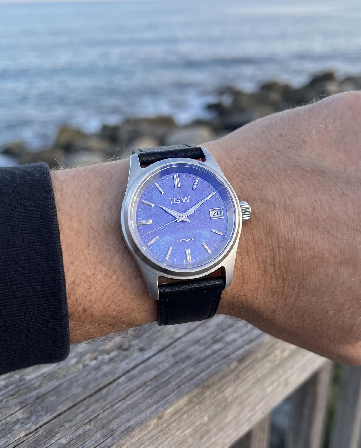 1GW Purple Frost 36mm automatic watch worn on the wrist at the coast