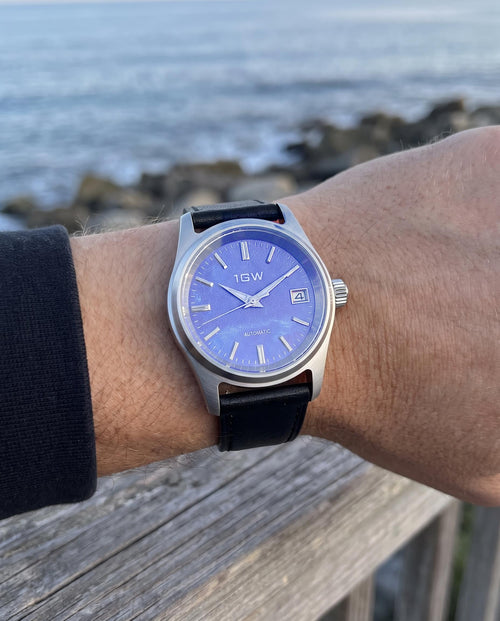1GW Purple Frost 36mm automatic watch worn on the wrist at the coast