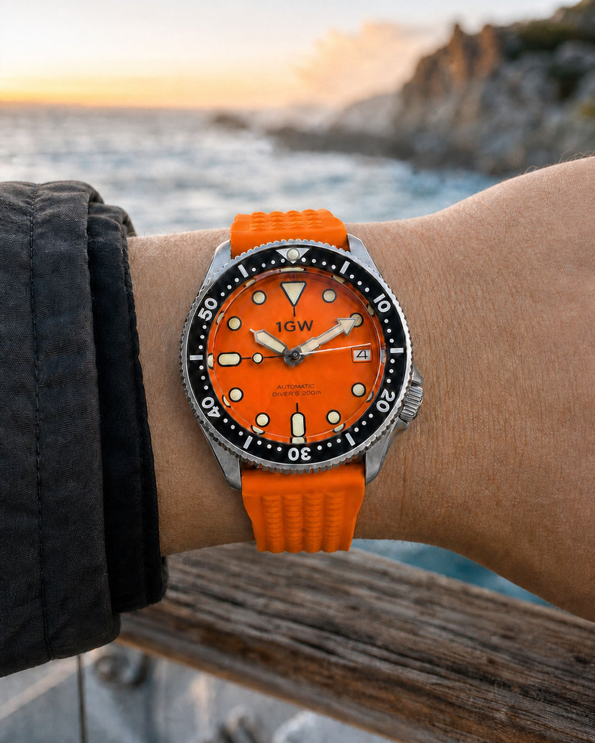 1GW Orange Diver 37mm on the outside of the wrist at the coast