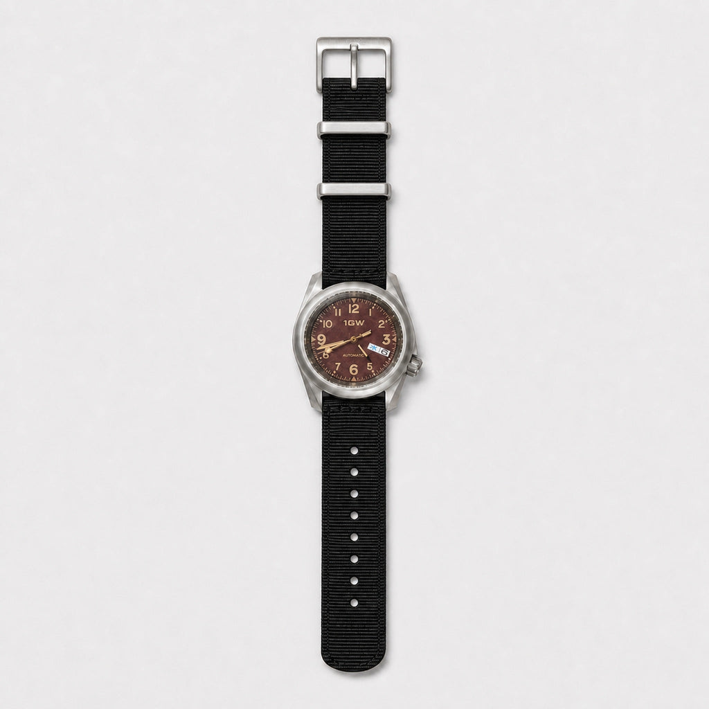 1GW Burgundy Day-Date flat overhead view with NATO buckle and metal keepers