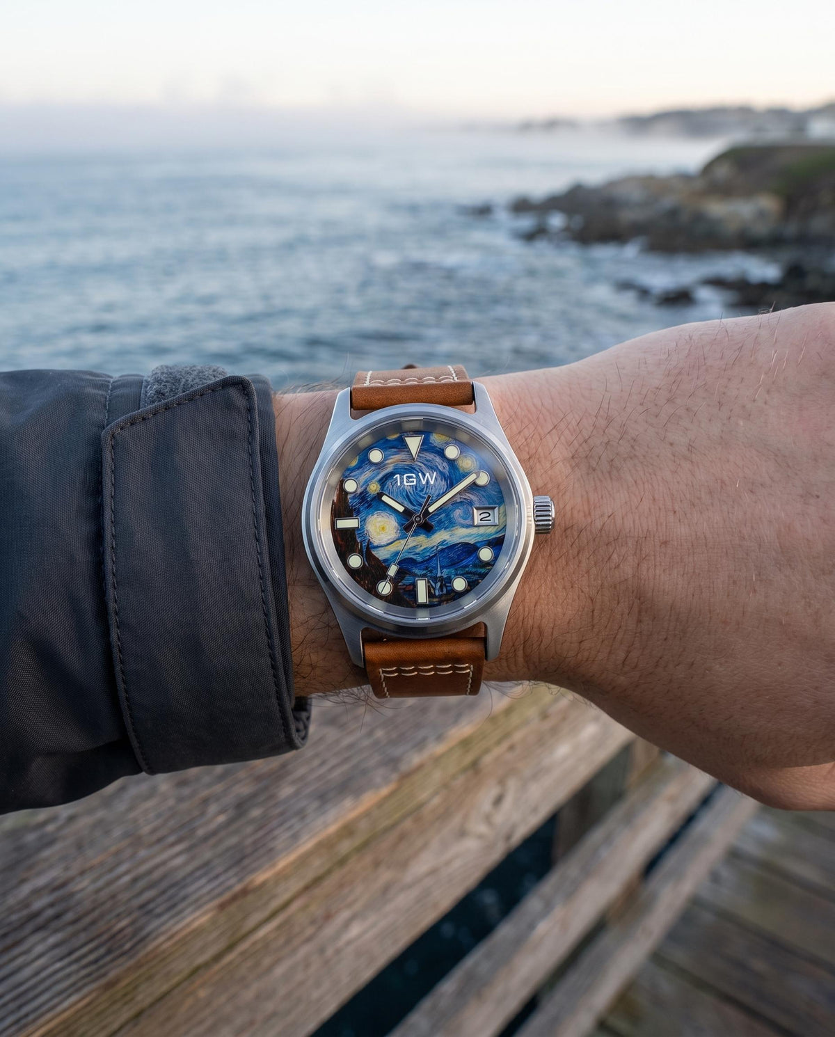 1GW Starry Night 36mm worn on the wrist at the coast, brown leather strap with white stitch