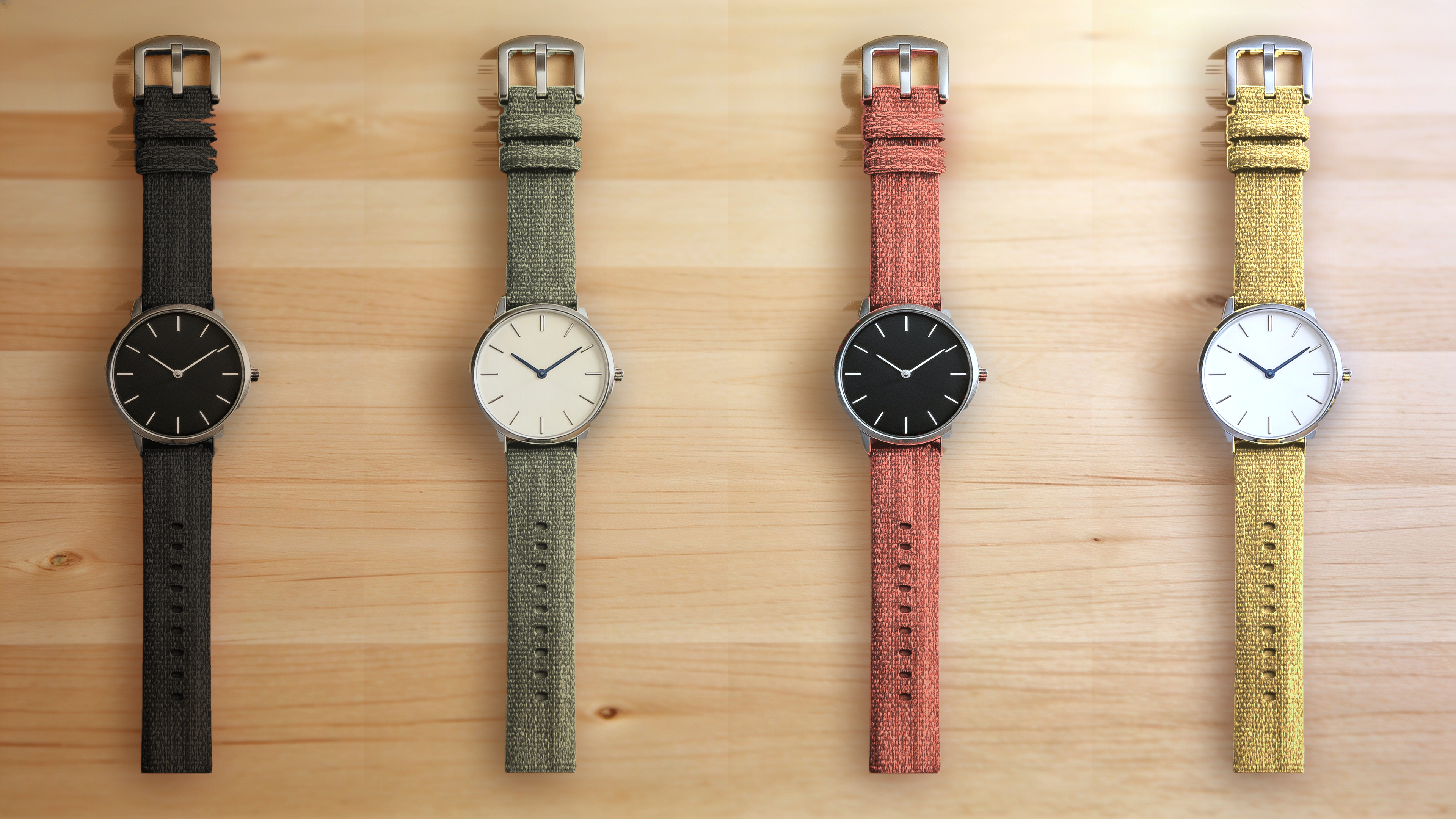1GW Black, Green, Orange and Yellow braided canvas watch straps, top-down flat lay on a light maple wood table