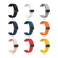 All nine colors of the 1GW magnetic silicone watch strap: black, white, gray, blue, green, orange, pink, red and yellow