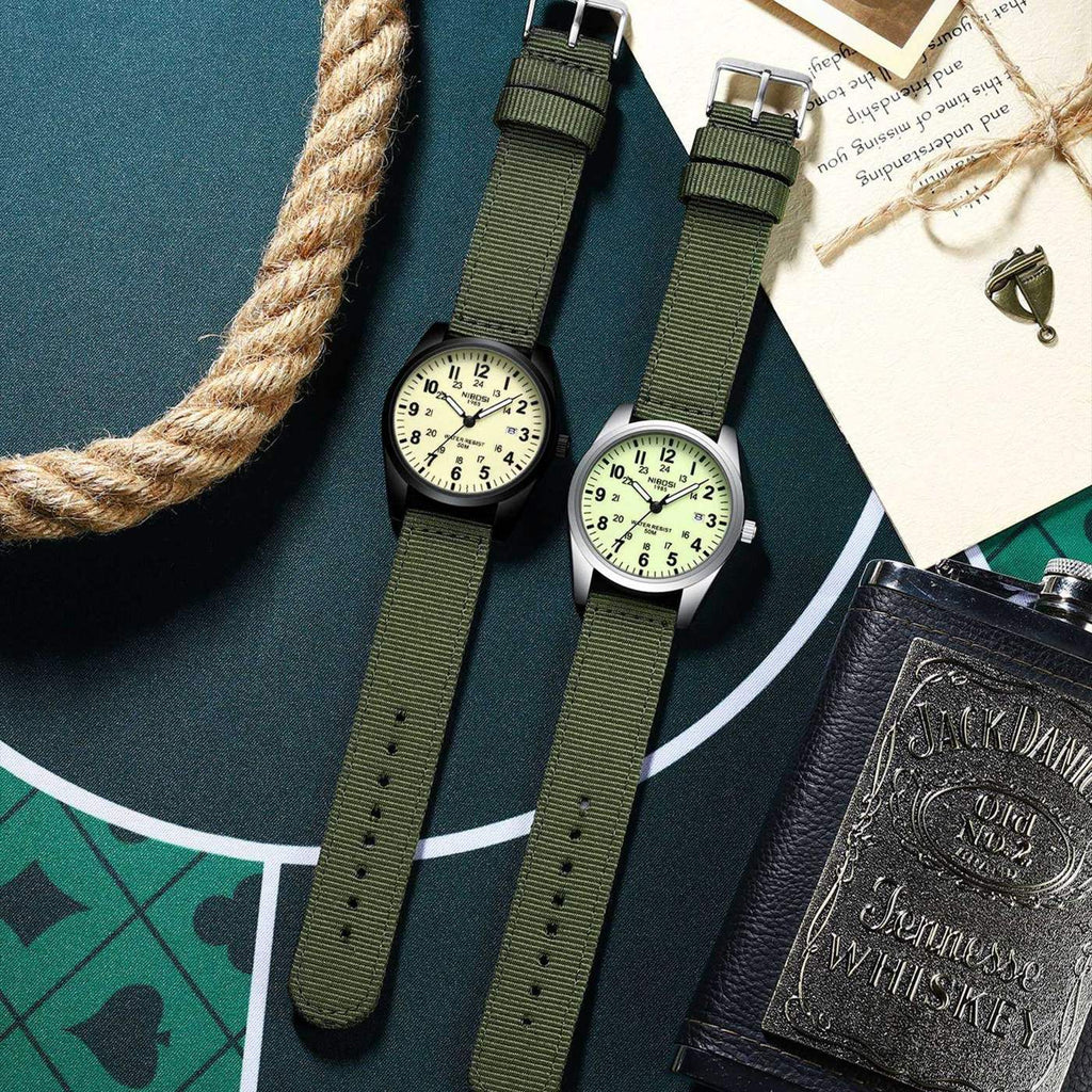 NIBOSI 2639 flat lay with rope, notebook and flask on a green background