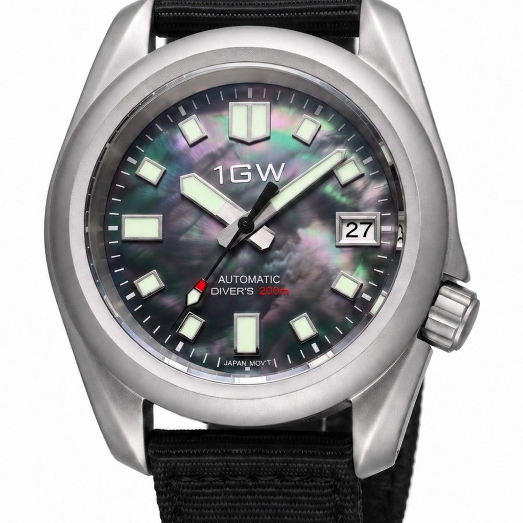 1GW Abalone Diver 200m - close watch-head view of the iridescent black abalone dial, lume markers and date window