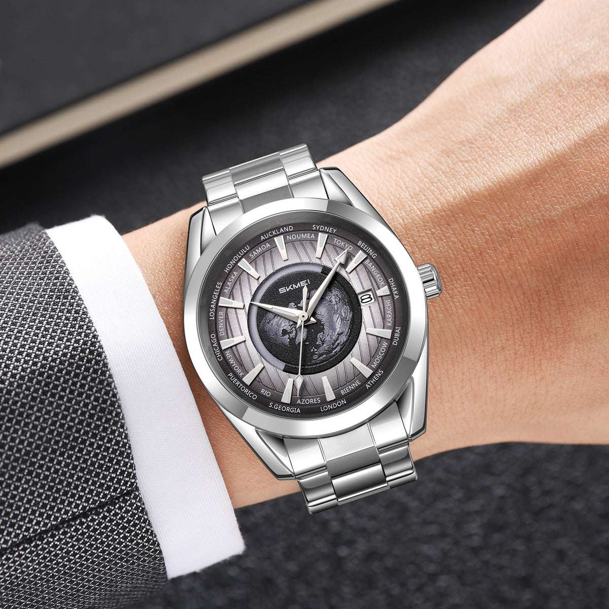 SKMEI 9399 automatic globe watch with black dial worn on a wrist