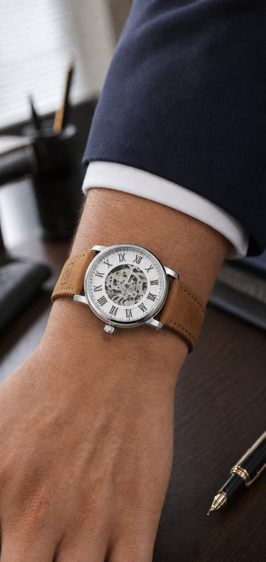 FORSINING 160G White Dial Brown Leather watch worn on the left wrist in a business setting