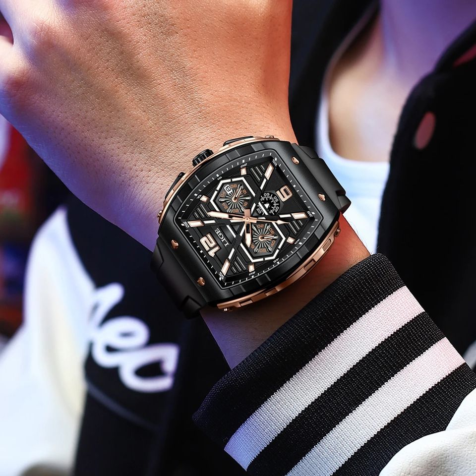 LIGE 89108 Gold and Black quartz sport watch worn on the wrist
