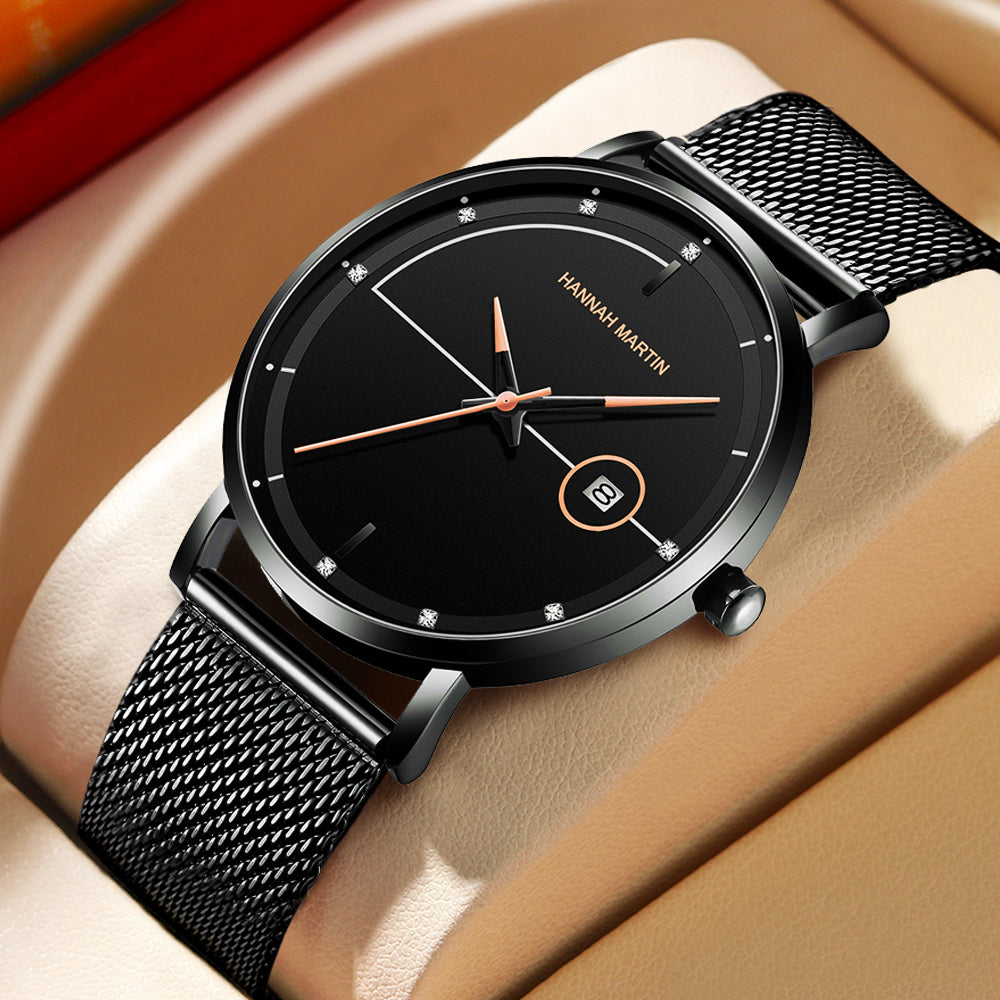 HANNAH MARTIN Minimalist Calendar 40mm, black dial with rose gold hands on black steel mesh, angled studio view