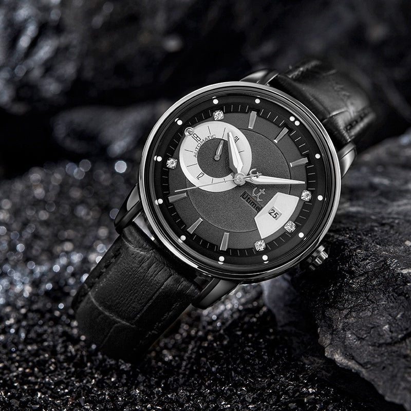 Utime U0041G automatic watch, black dial, silver case, black leather strap, angled lifestyle shot