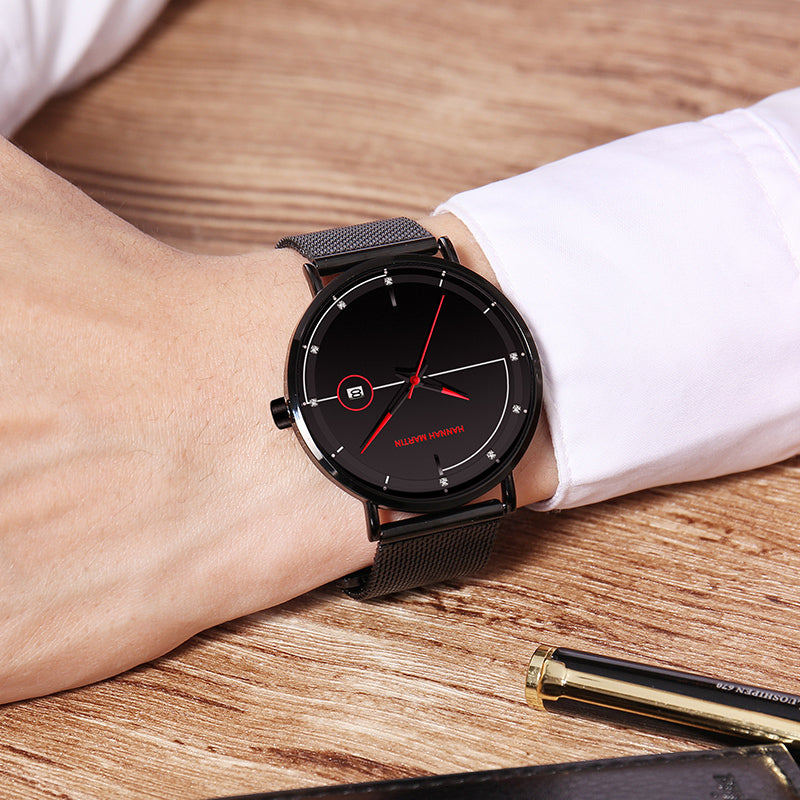 HANNAH MARTIN Minimalist Calendar 40mm, black dial with red hands on black mesh, worn with a white shirt