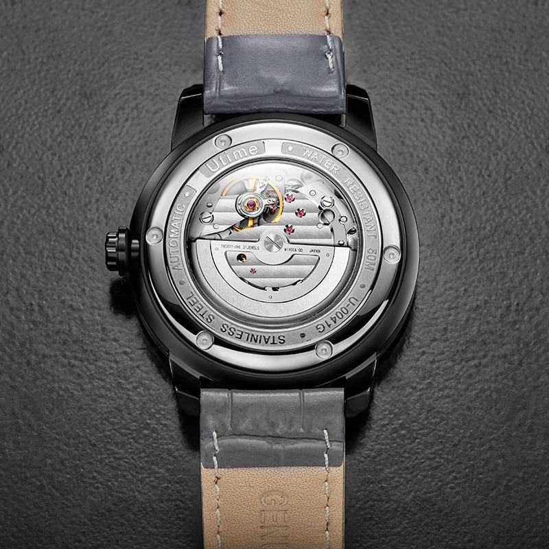 Utime U0041G caseback detail, automatic movement visible, model number U-0041G