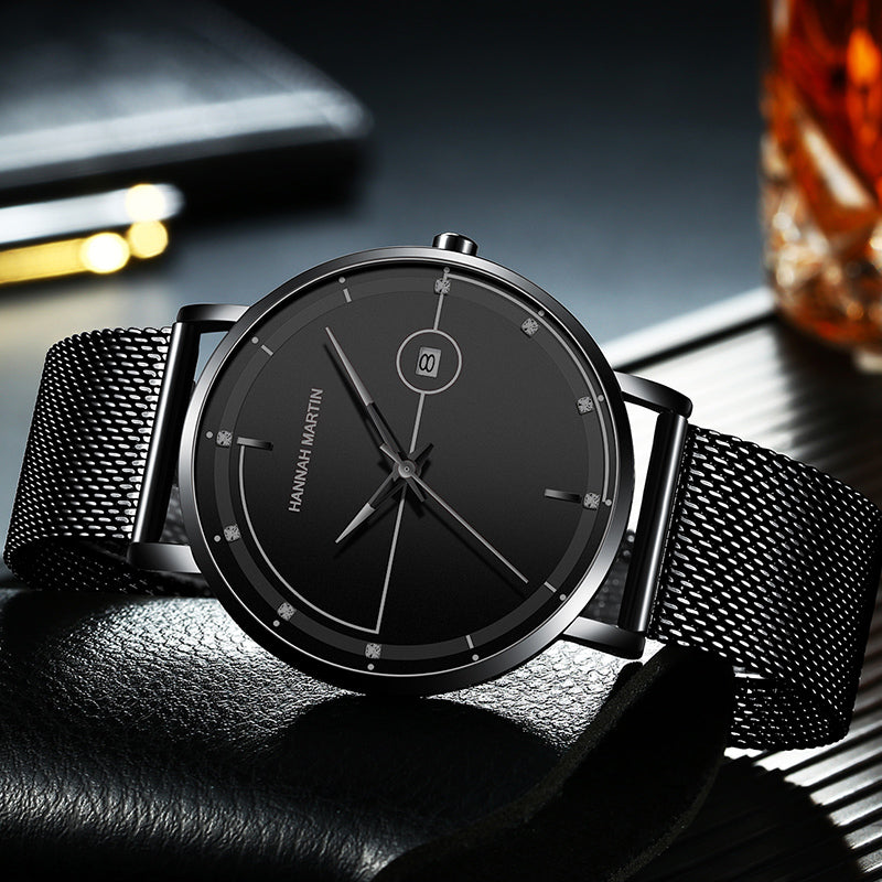 HANNAH MARTIN Minimalist Calendar 40mm, black dial with black hands on black steel mesh, angled studio view