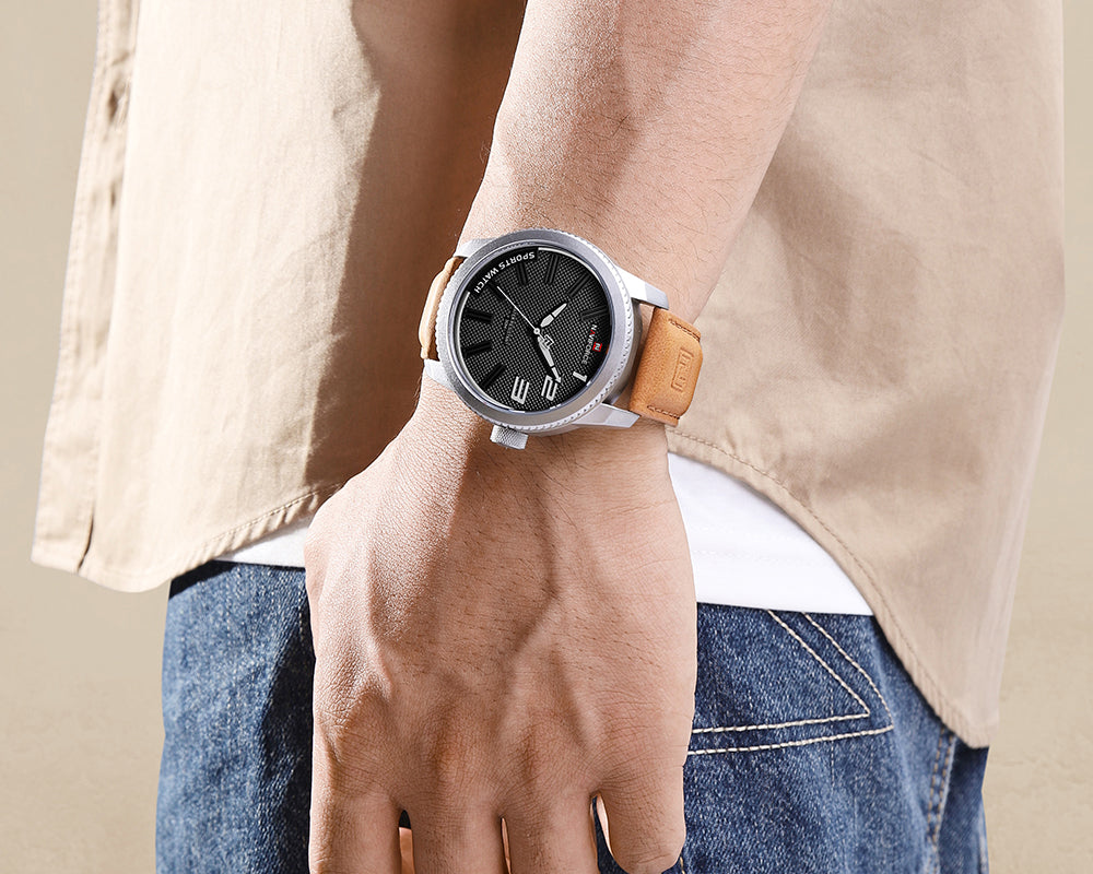 NAVIFORCE NF9202L worn on the wrist, silver case with light-brown leather strap