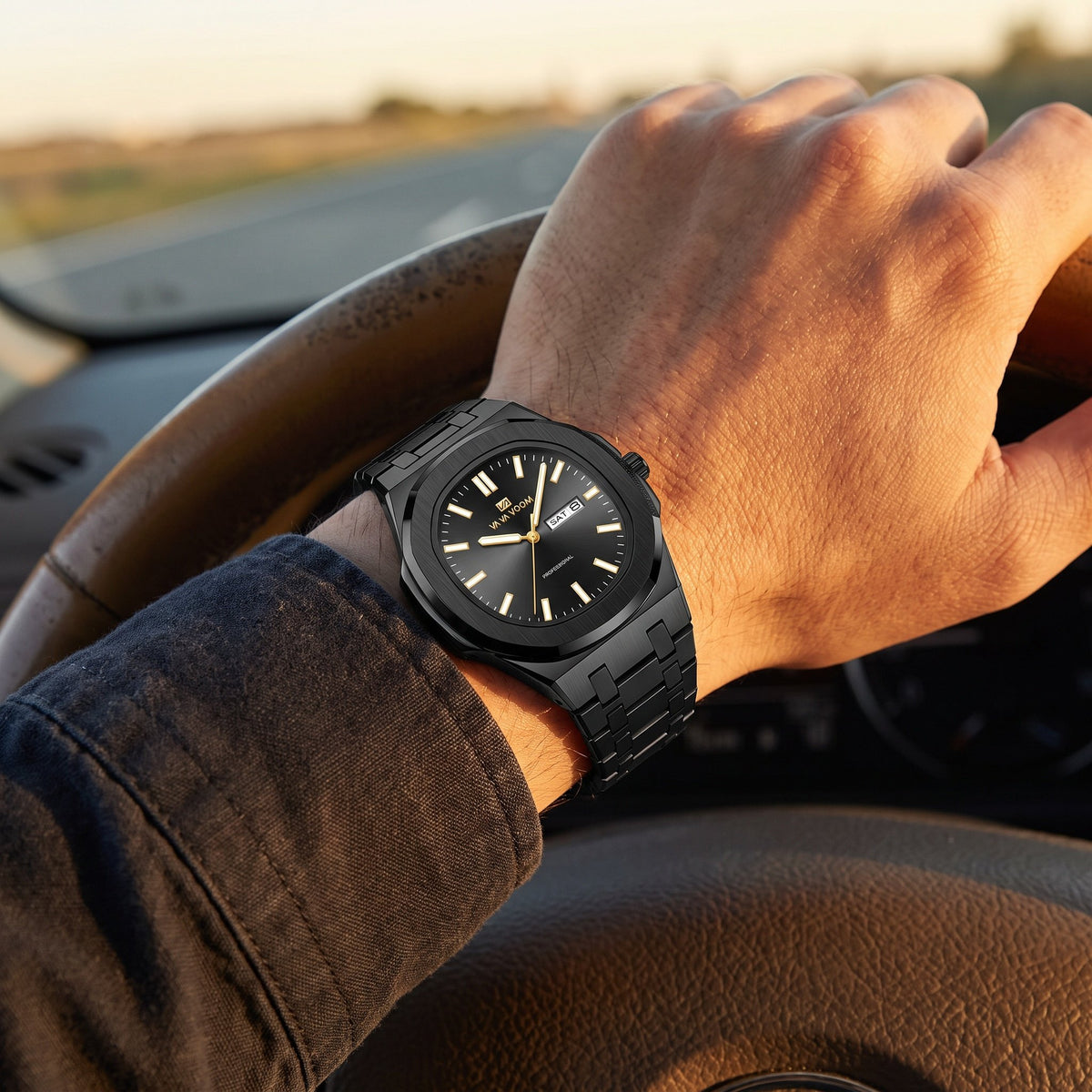 VA VA VOOM Octagonal Day-Date watch, black with gold hands, worn on the wrist while driving