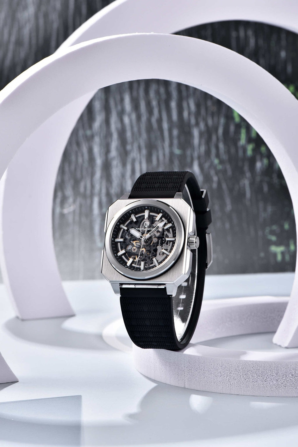 Pagani Design black skeleton automatic watch in white studio setting