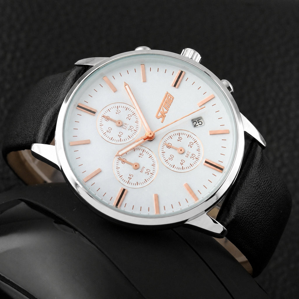SKMEI 9103 white dial chronograph with black leather strap, angled detail