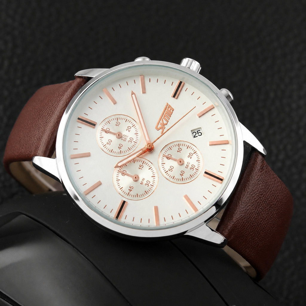 SKMEI 9103 white dial chronograph with brown leather strap, angled detail