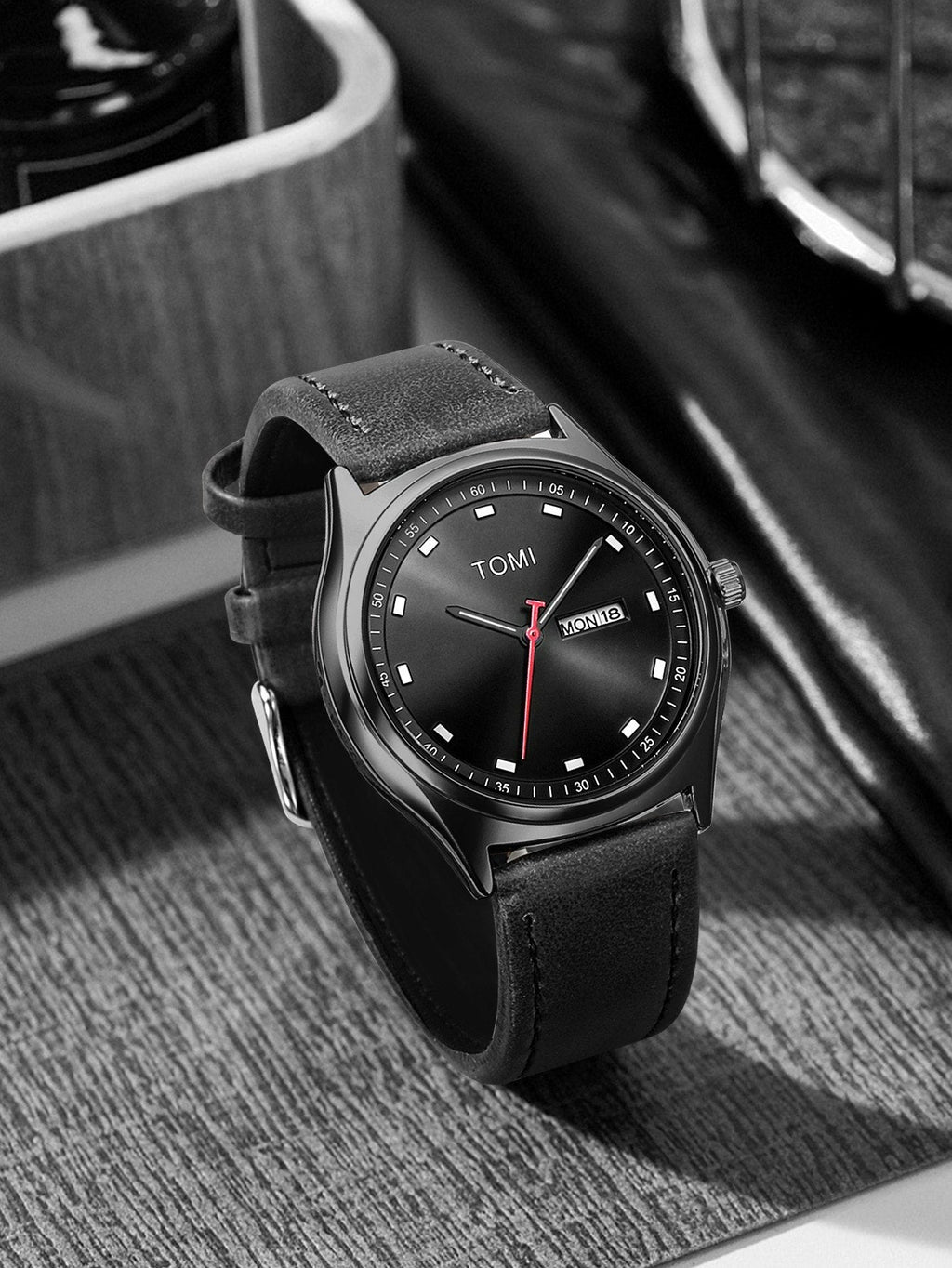 TOMI Black minimalist calendar watch supplier lifestyle display