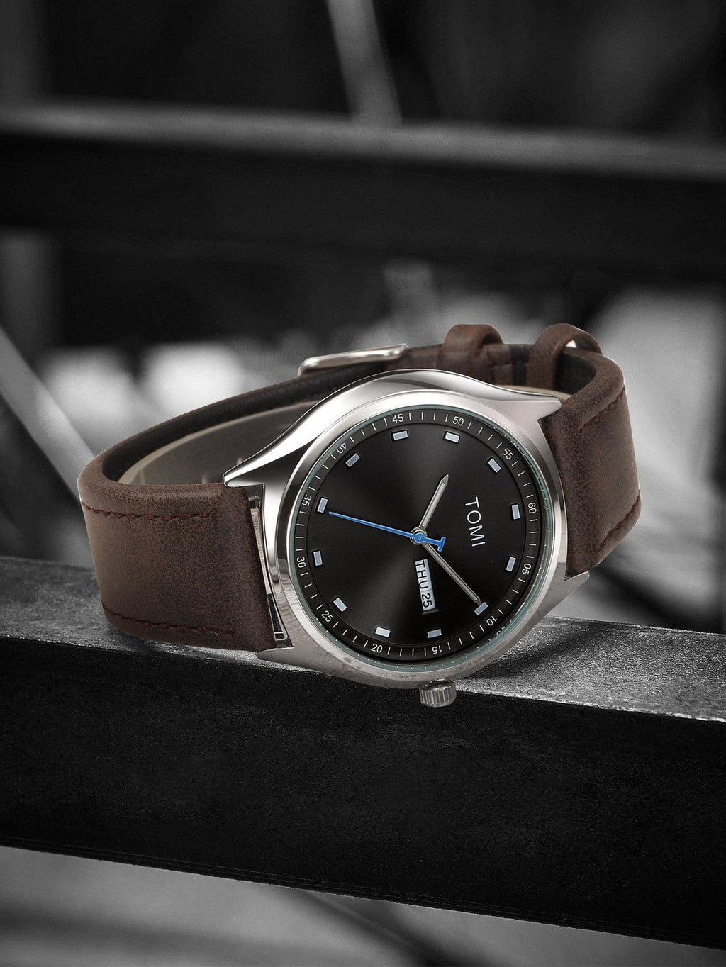 TOMI Brown Silver minimalist calendar watch supplier flat lay