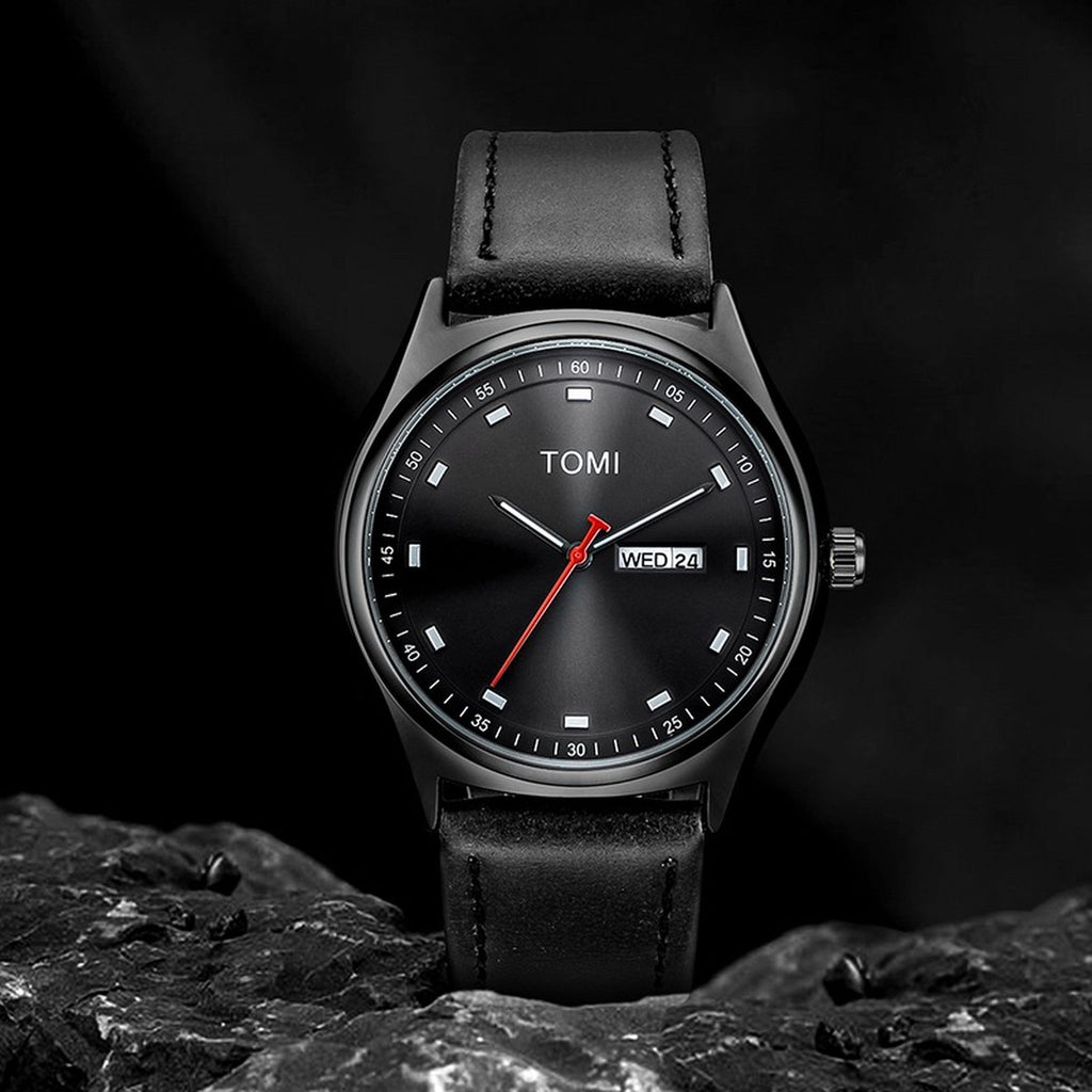 TOMI Black minimalist calendar watch supplier studio view