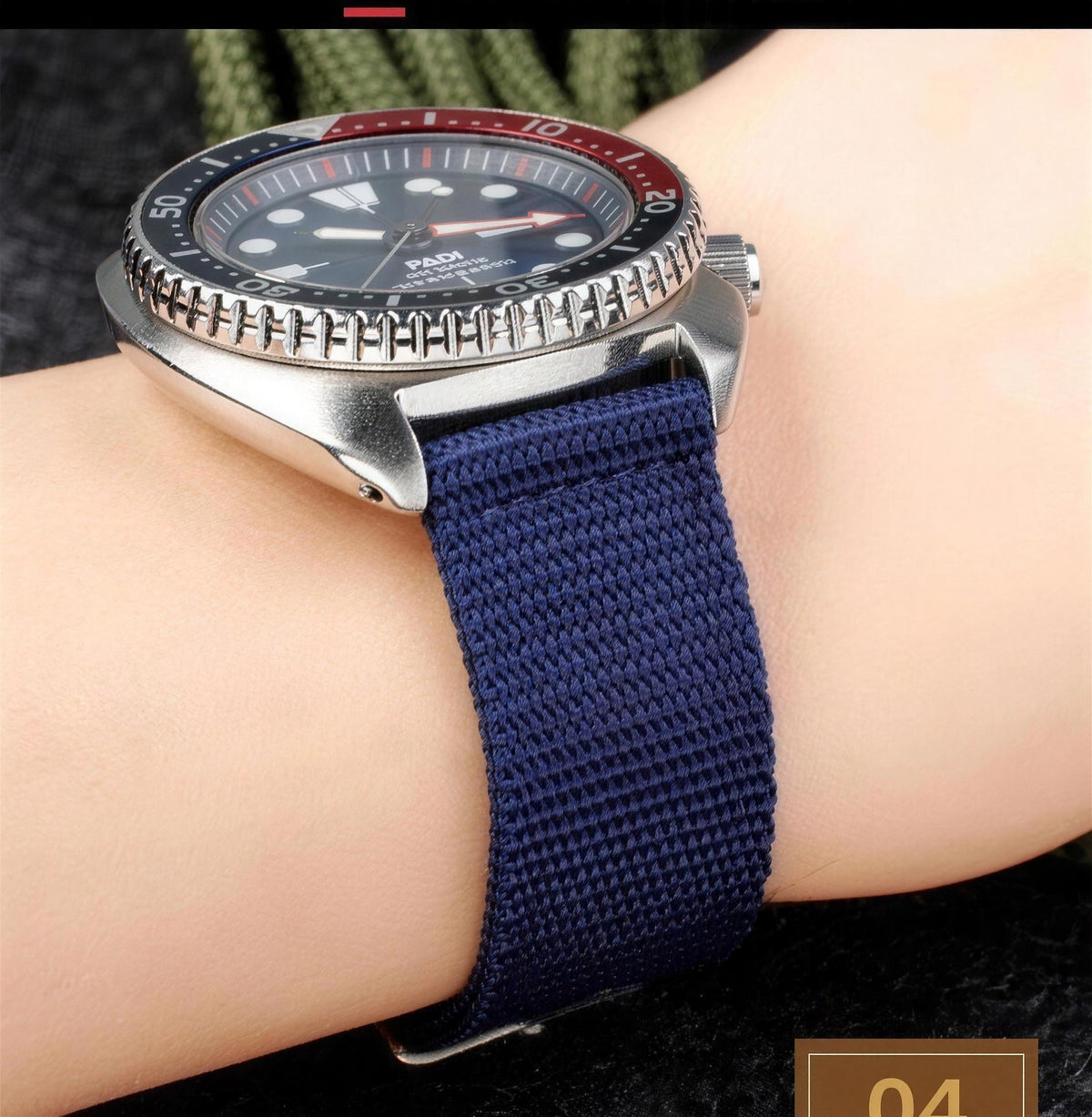Blue UPro Classic Ballistic Nylon watch strap worn on the wrist with a steel dive watch