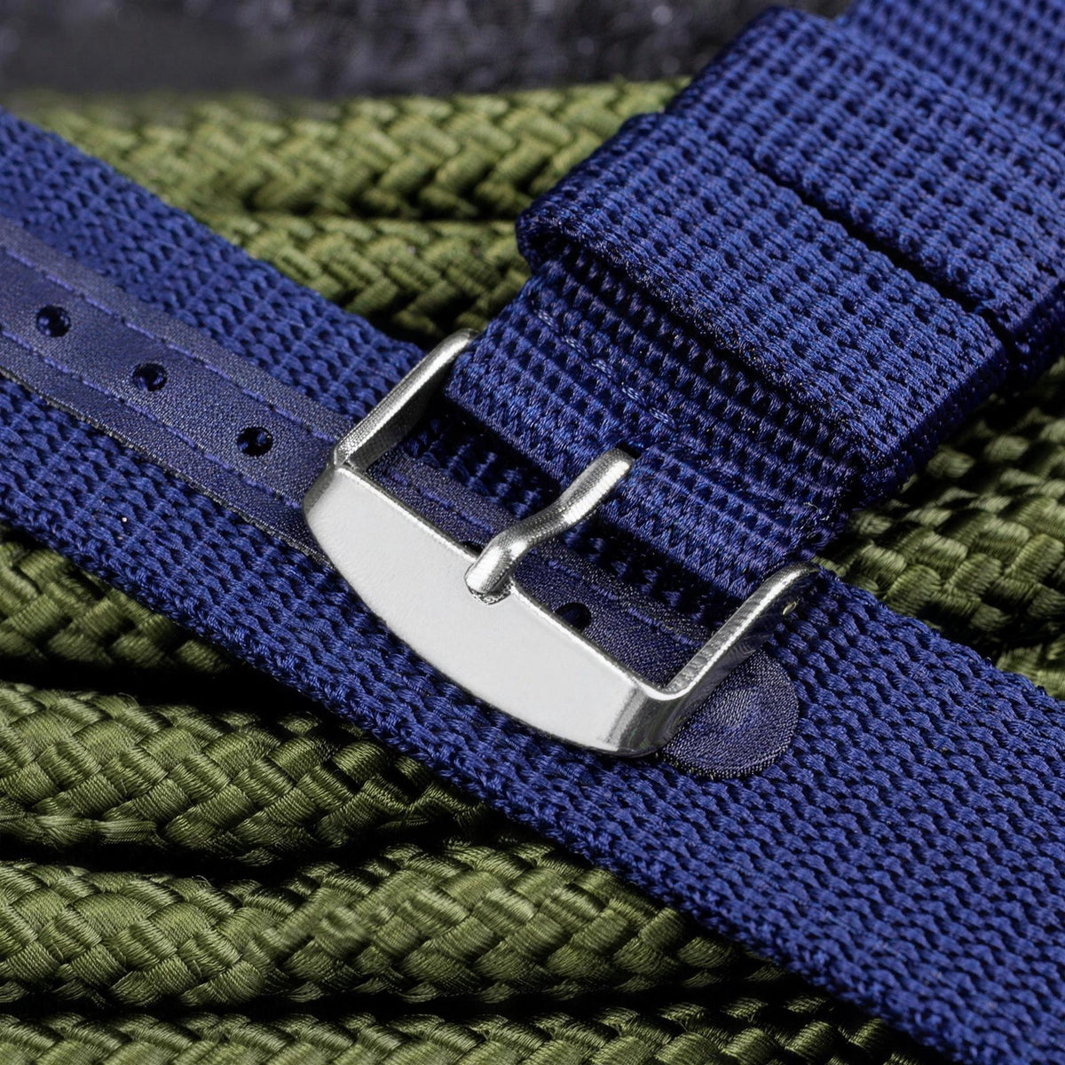 Close-up of the polished pin buckle on the blue UPro Classic Ballistic Nylon watch strap