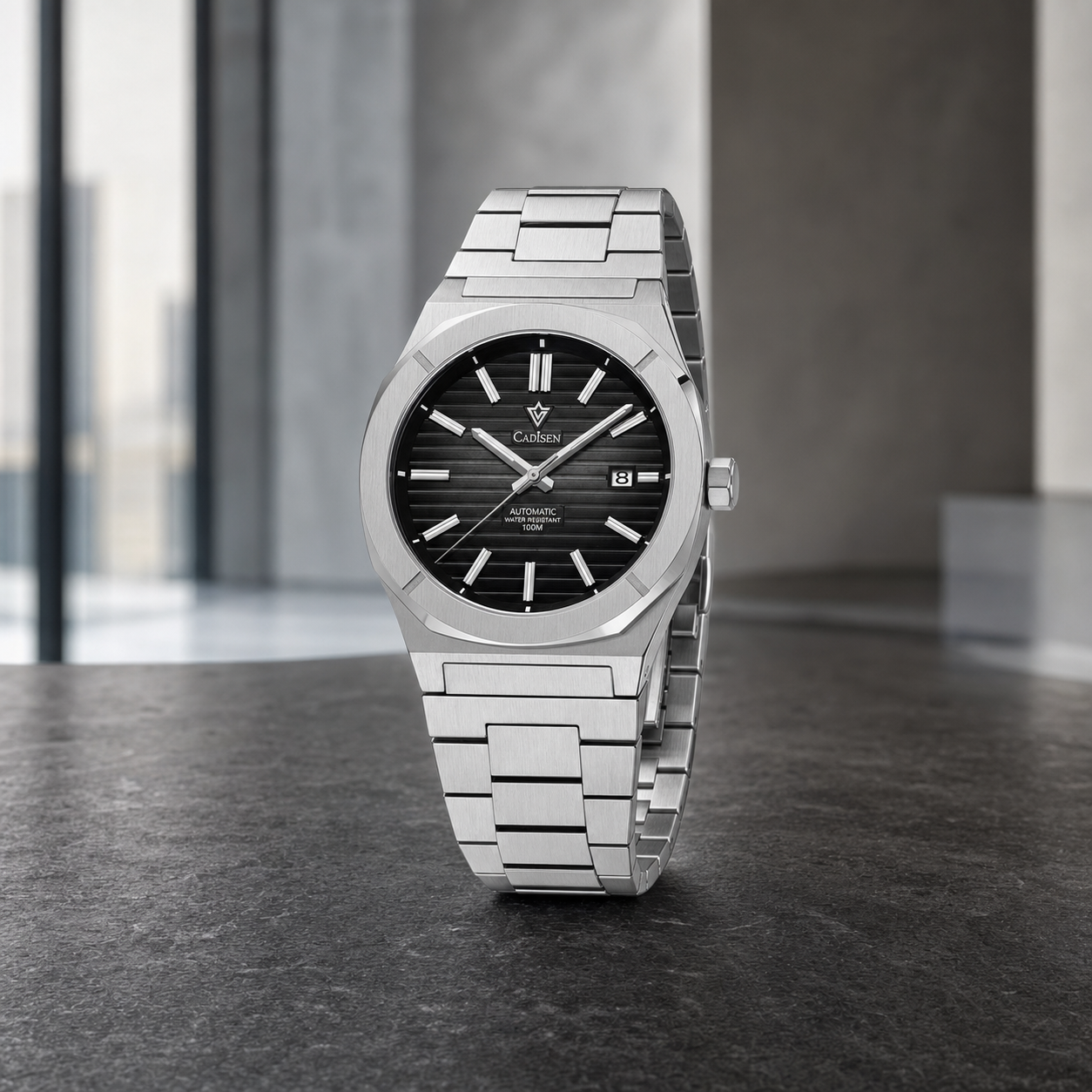 CADISEN C8200 integrated-bracelet automatic watch in a modern office setting