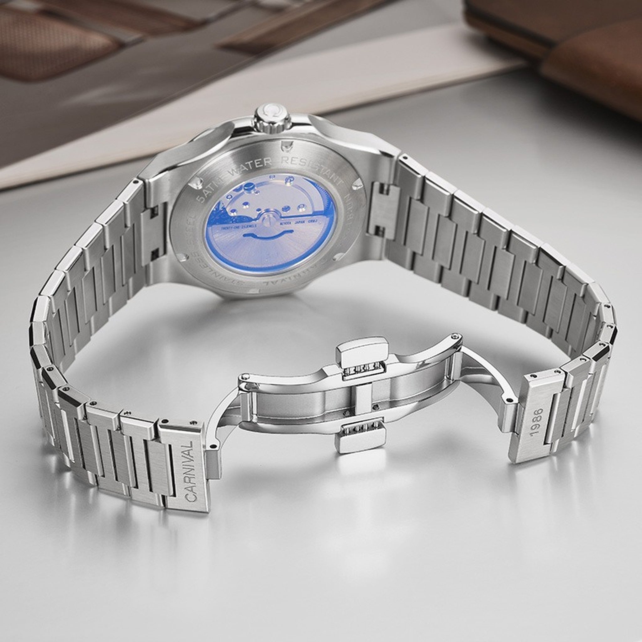 Carnival automatic watch exhibition caseback and butterfly clasp
