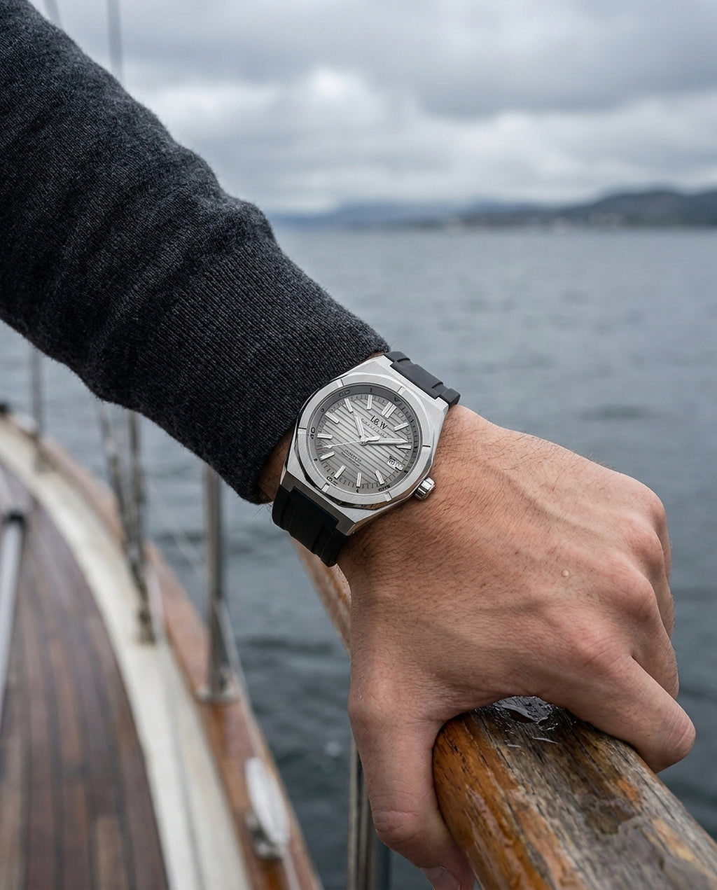 Carnival IW711G automatic watch worn at a sailboat rail