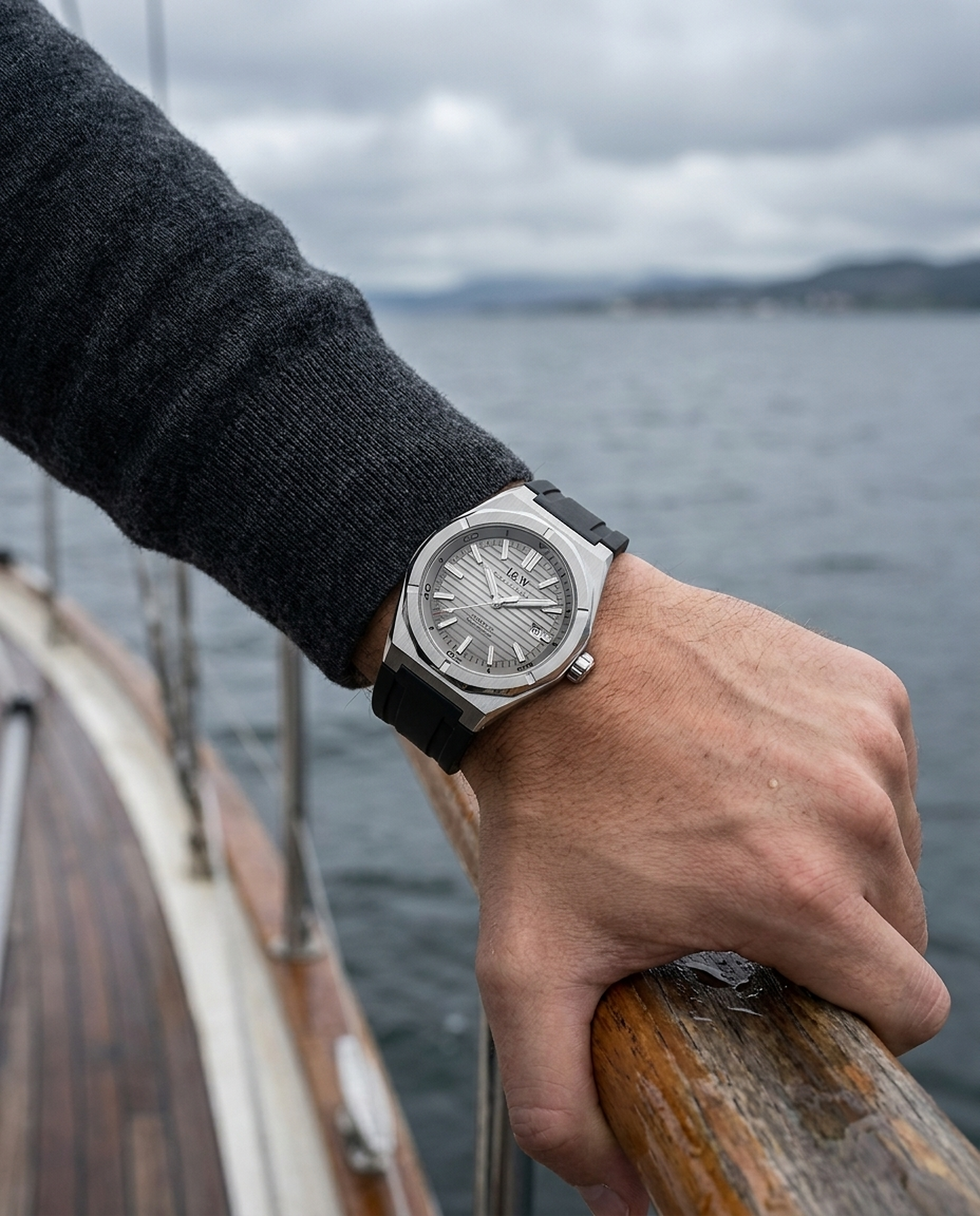 Carnival IW711G automatic watch worn at a sailboat rail