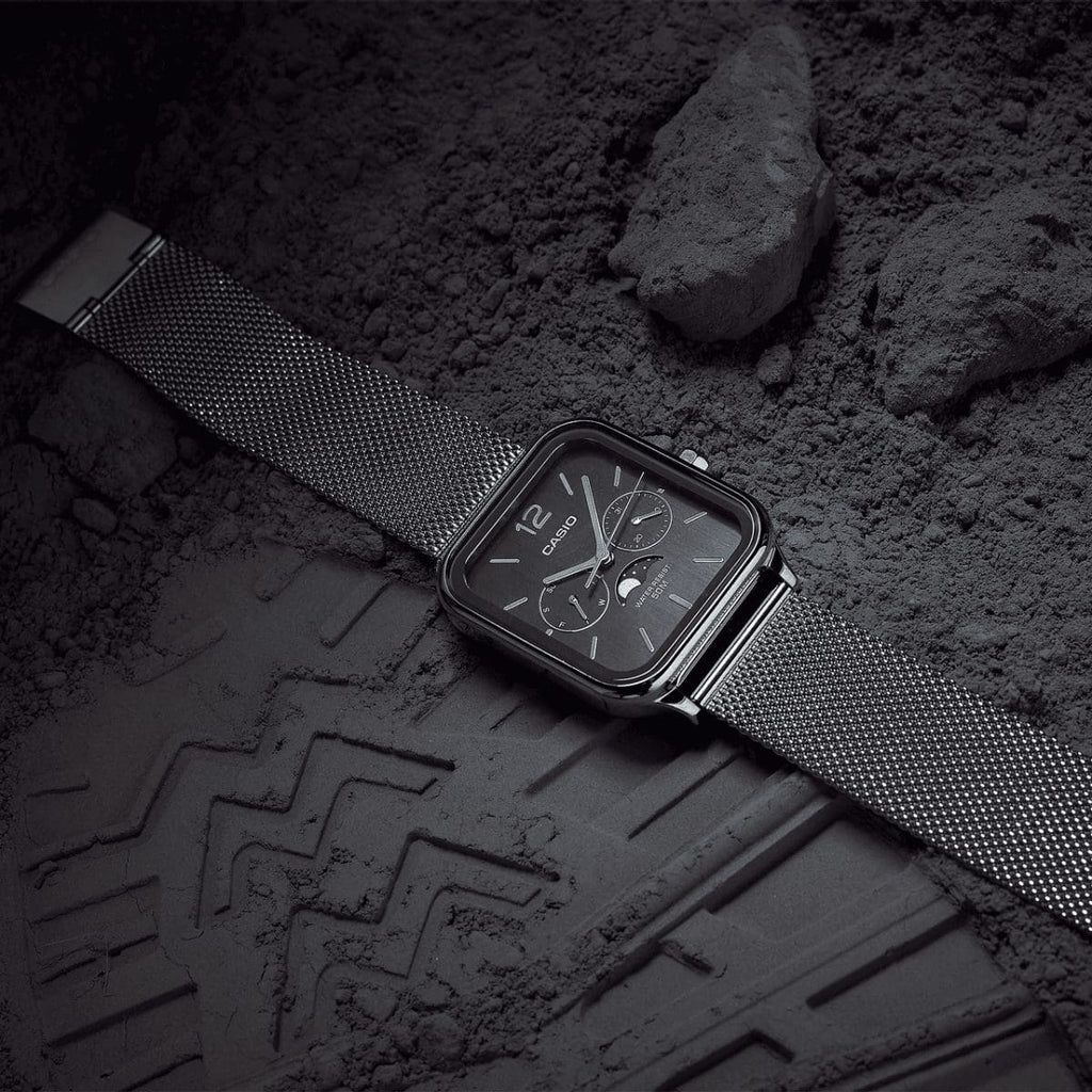 Casio black dial moon phase watch with silver mesh bracelet