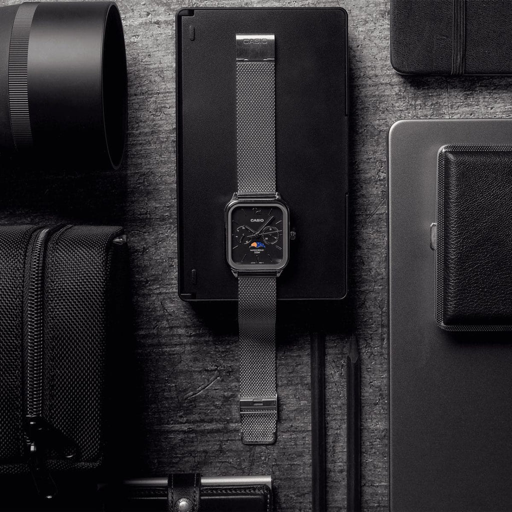 Casio moon phase watch with black dial and silver mesh bracelet