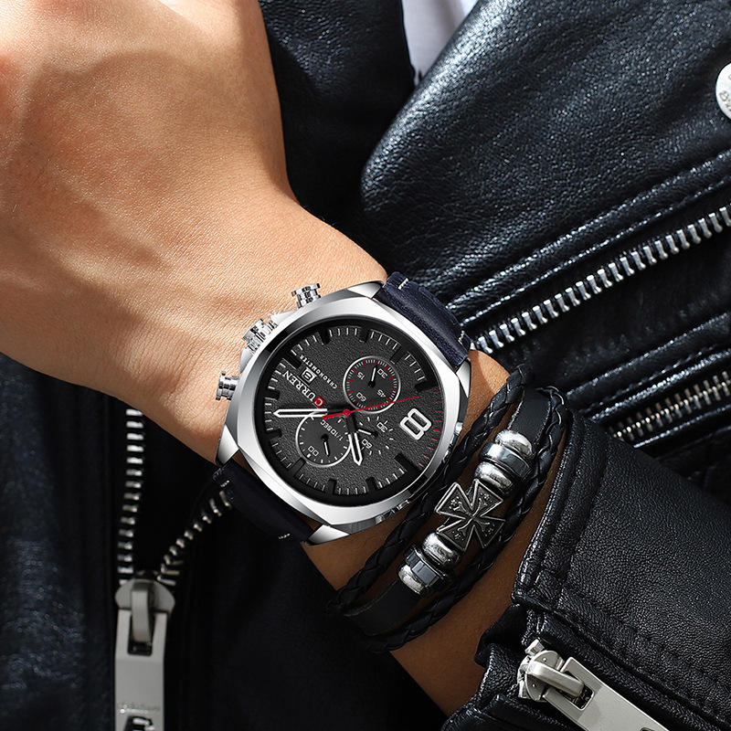 CURREN 47mm leather chronograph watch in Black worn on wrist