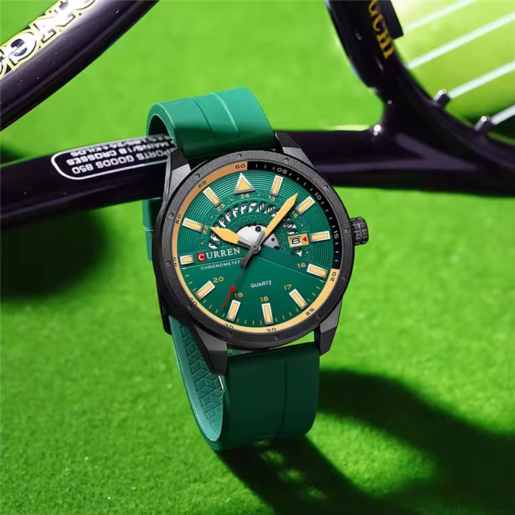 CURREN 8421 green silicone quartz watch photographed beside a tennis racket