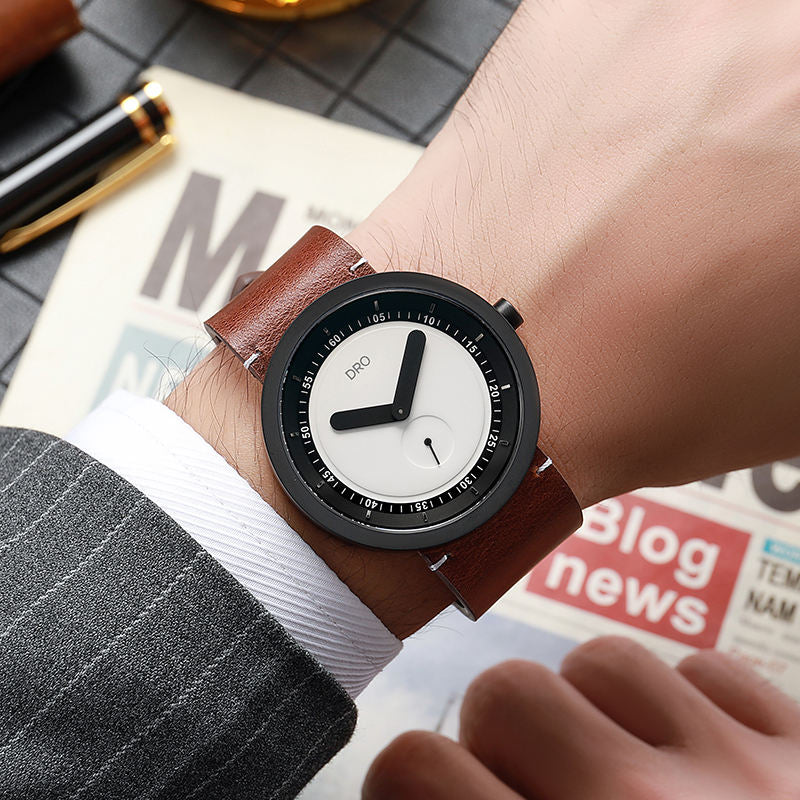DRO sapphire quartz watch — brown leather and black case on wrist