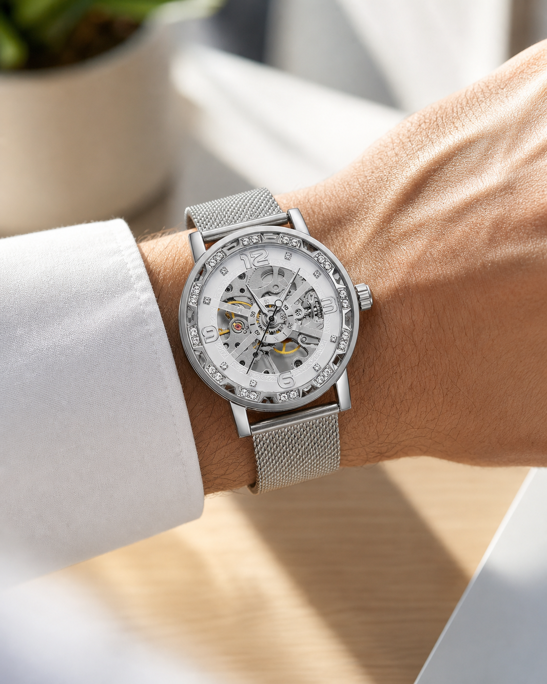 FORSINING 614 M4T7 on-wrist image, silver mesh bracelet and white skeleton dial