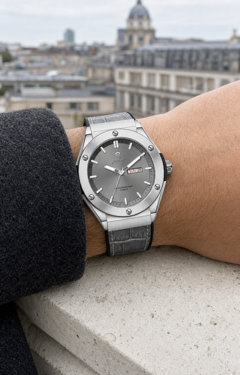 GOHUOS 8820 grey watch worn on a limestone city ledge