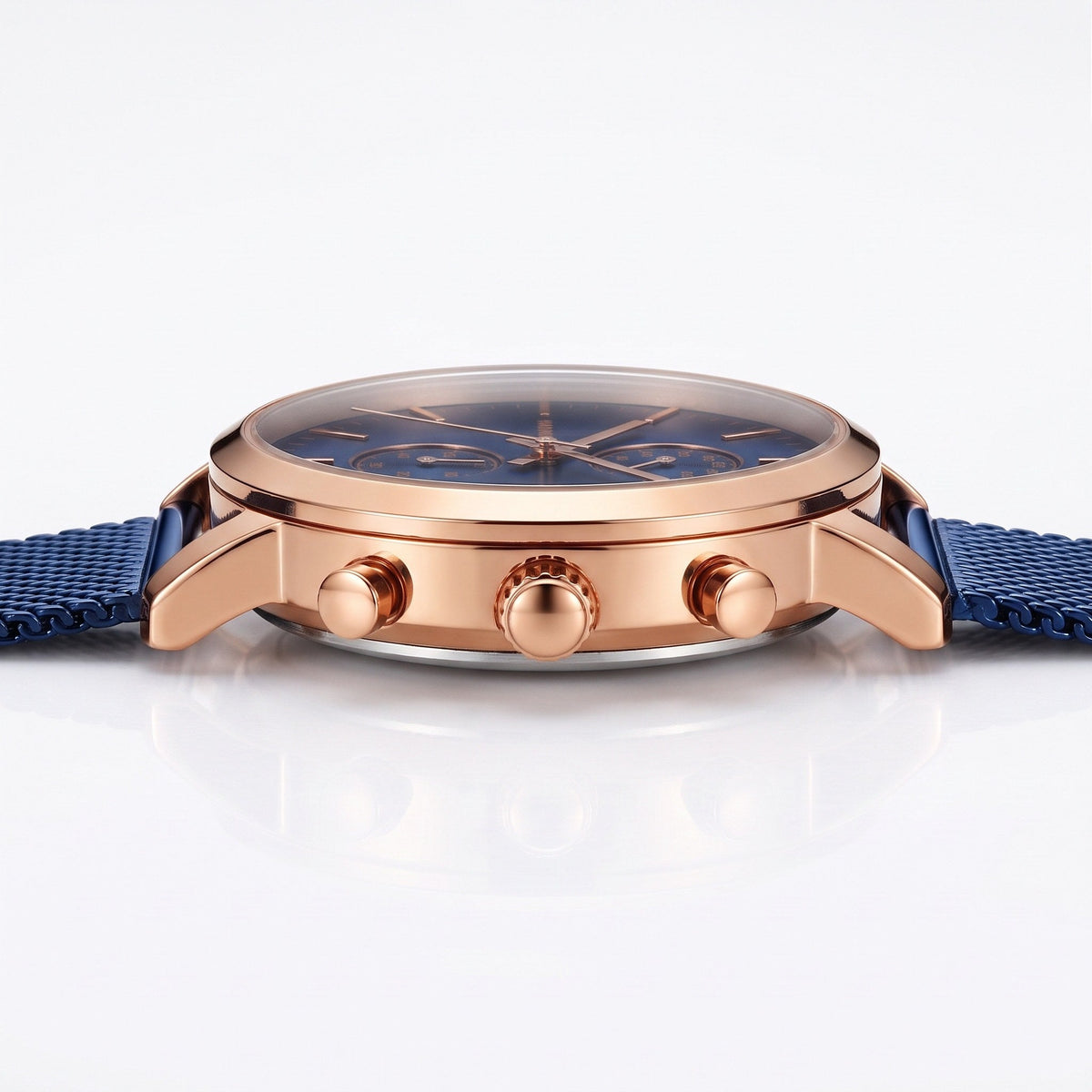 HANNAH MARTIN Mesh Chronograph 45mm, rose gold case on blue mesh, side profile showing the 11mm case, crown and pushers