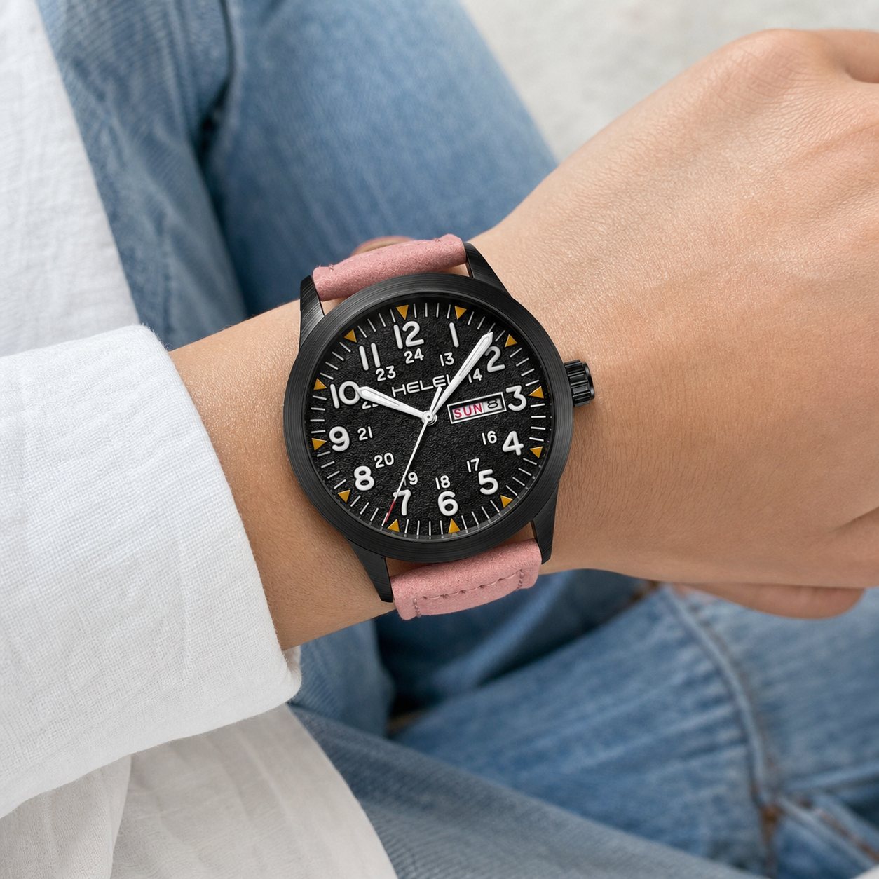 HELEI 42mm Black case pink dial field-style quartz watch worn in daylight